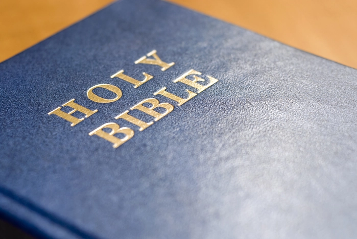 The cover of a blue Bible